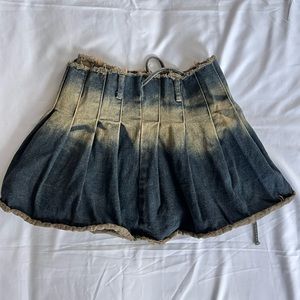 Washed denim pleated skirt